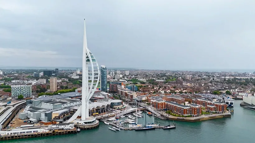 Waterfront and harbour tower from the air, drone property photography London