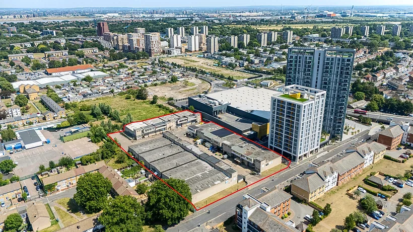 Drone over industrial estate and towers, commercial photography London