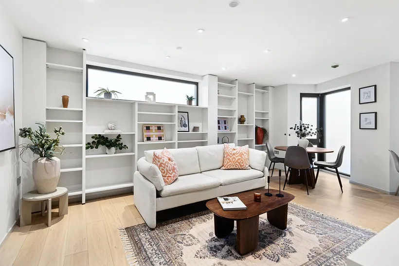 Bright living room with soft furnishings, Airbnb photography London