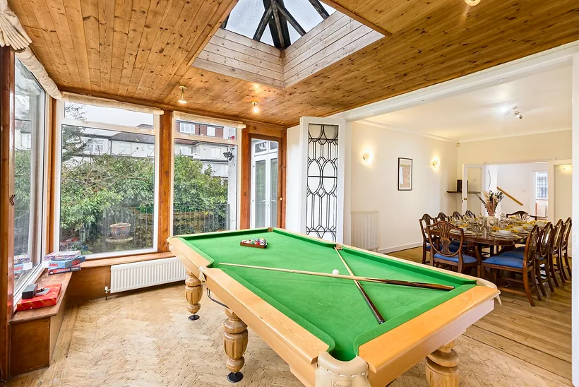 Pool table in garden conservatory, Airbnb photography London