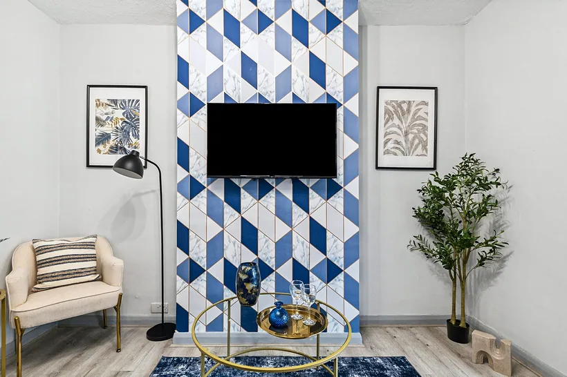 Blue tile feature wall living room, Airbnb photography London