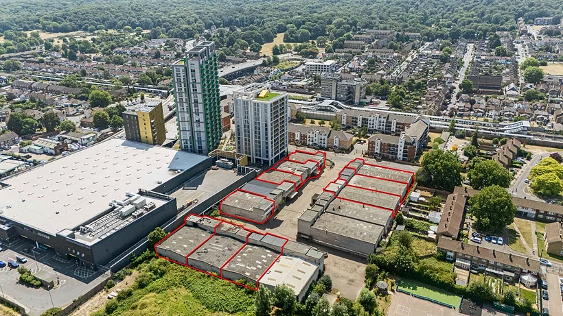 Drone over an industrial estate and rows of houses, commercial photography London