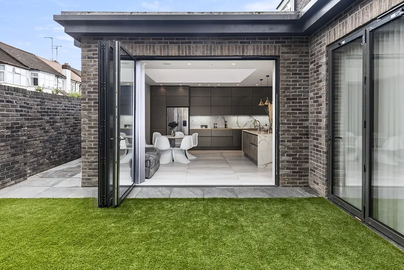 Kitchen extension opening onto the garden, developer photography London