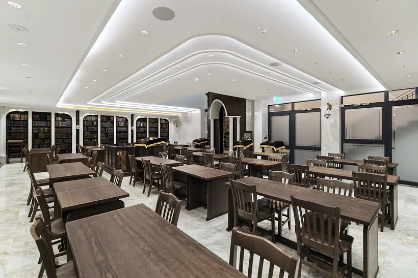 Dining hall under a sculpted lit ceiling, developer photography London
