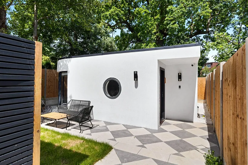 Garden studio exterior, clean modern build, developer photography London