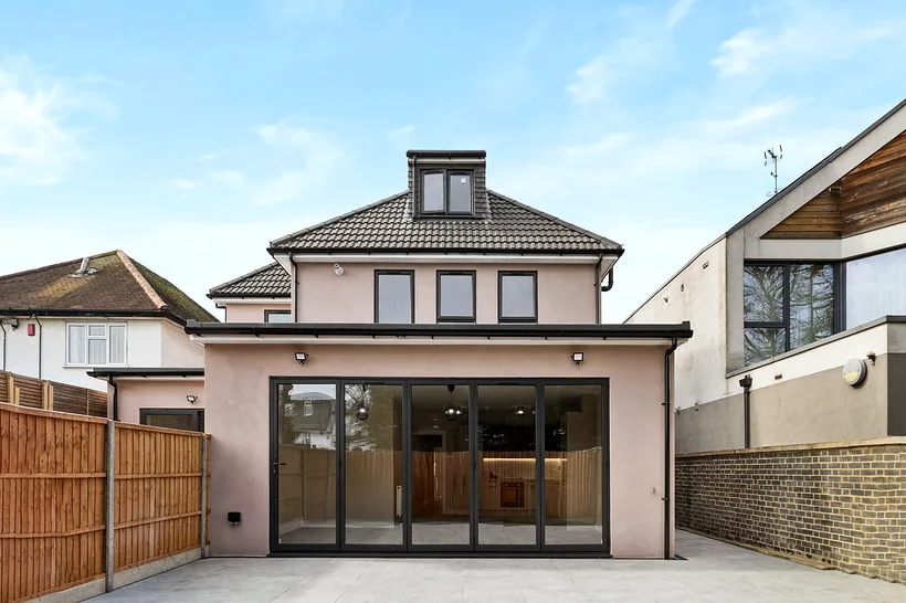 New-build rear with full-width glazing, developer photography London