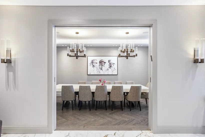 Dining room framed by an arch, interior photography London