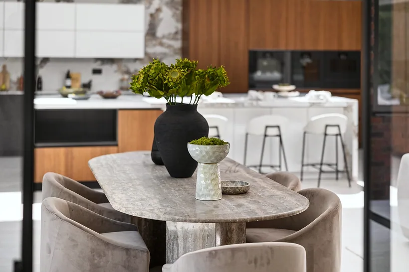 Designer dining kitchen, walnut and marble, styled table, interior photography London