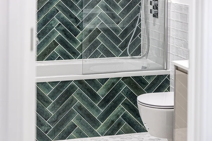 Bathroom with green herringbone tiles, kitchen photography London