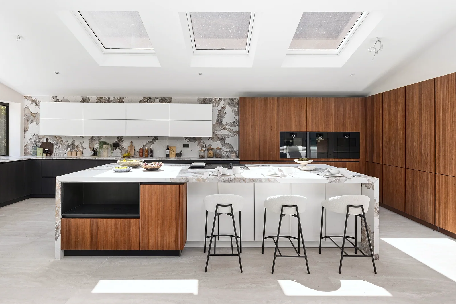 Kitchen island under skylights, kitchen photography London