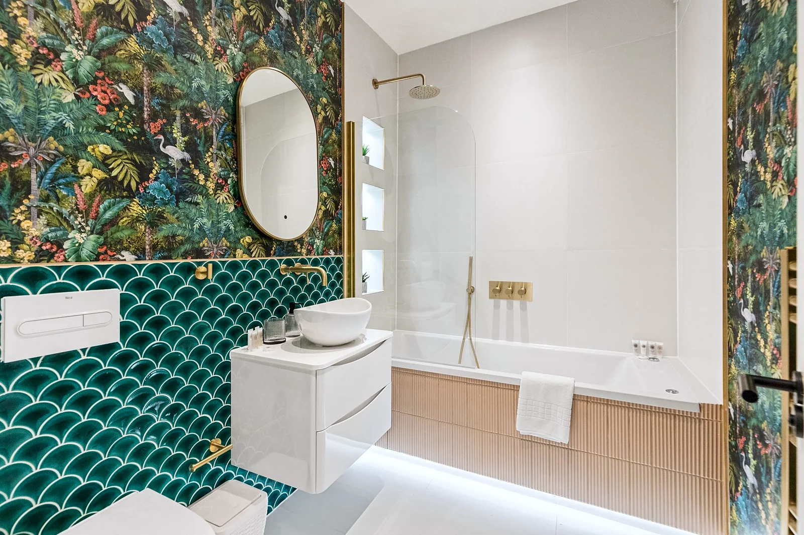 Emerald fish-scale tiles + jungle wallpaper bathroom, brass fittings, kitchen photography London
