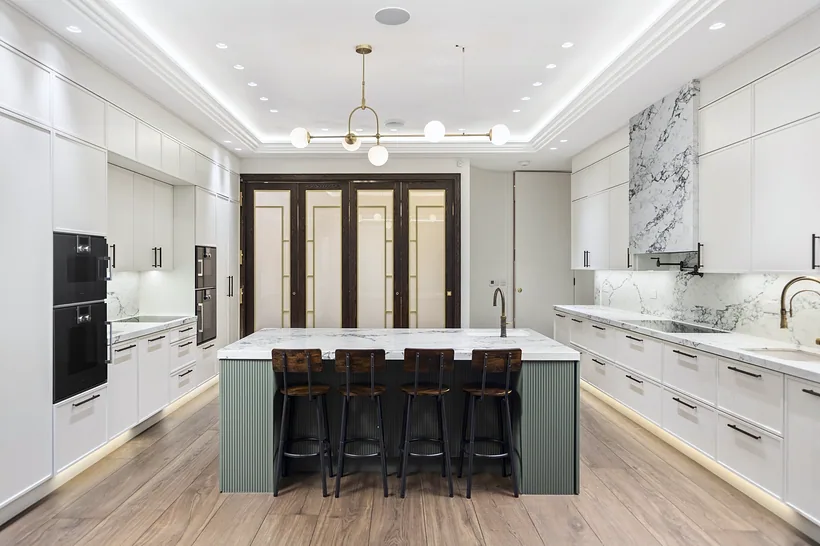 Sage island, marble splash, pendant over herringbone, kitchen photography London