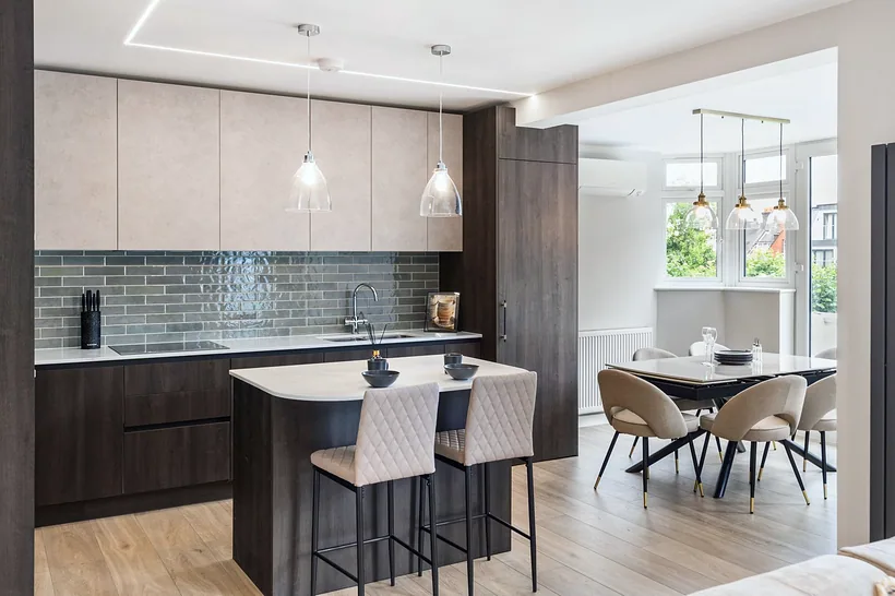 Walnut kitchen island with sage zellige splashback, kitchen photography London