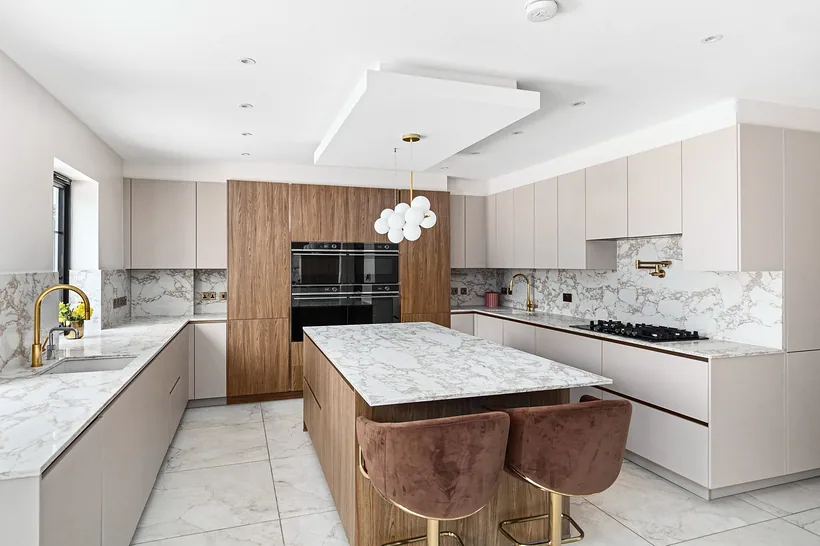 Marble island, blush stools, kitchen photography London