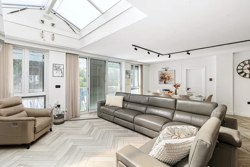 Living room under a skylight, estate agent photography London