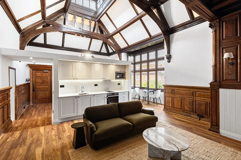 Chapel-style timber roof over open-plan living, estate agent photography London