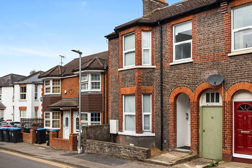 Victorian red-brick terrace with red door, estate agent photography London